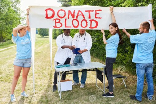 team-volunteer-advertises-blood-donation-sets-up-booth-campaign-137911287